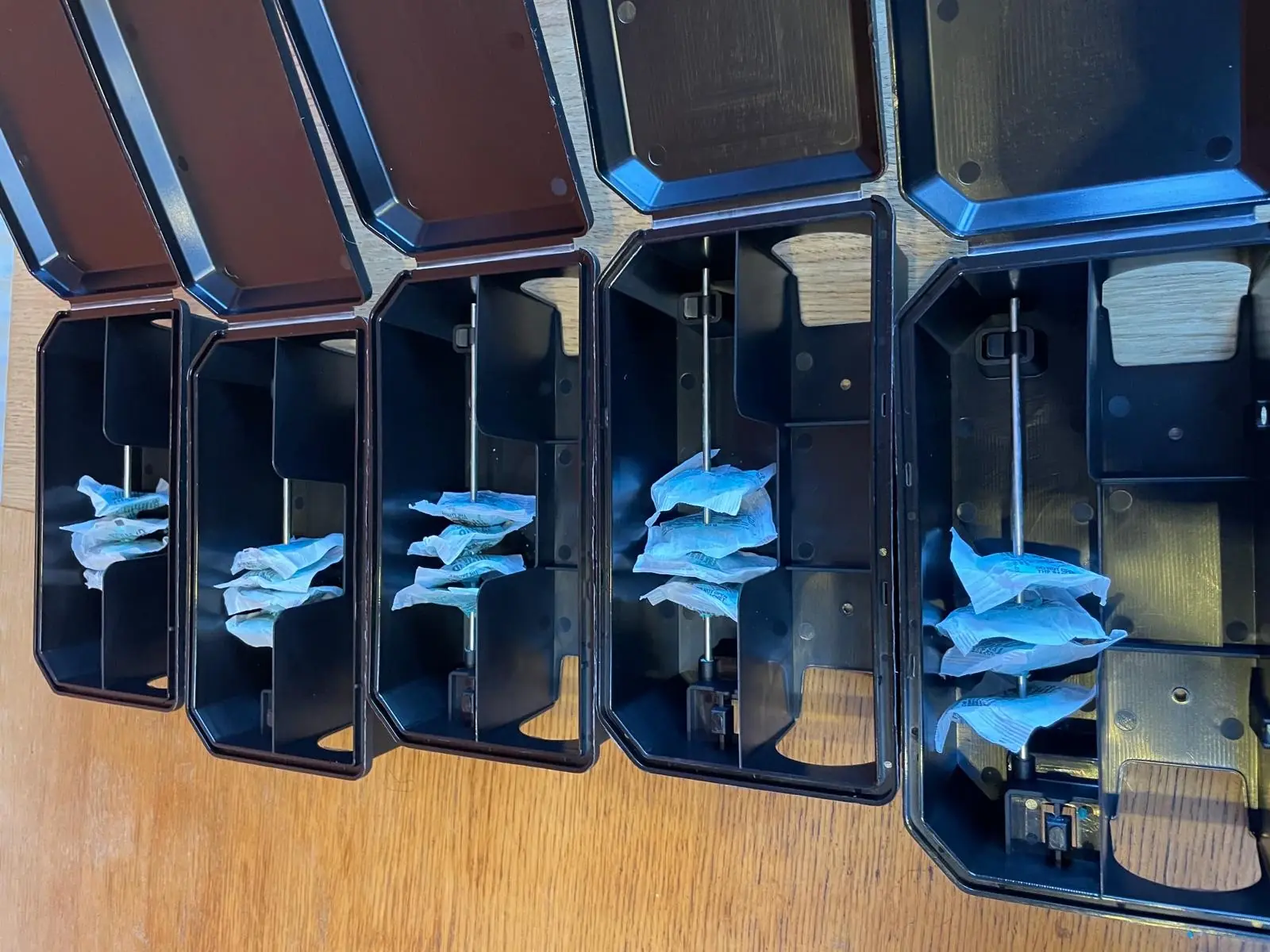 Professional tamper-resistant rat bait stations prepared for deployment