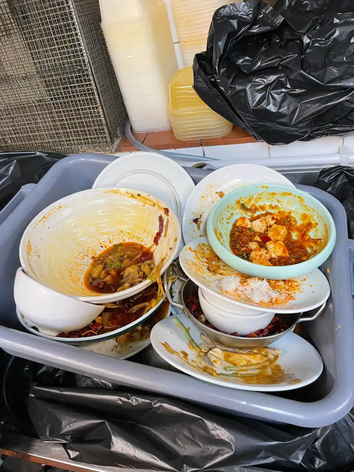 Restaurant kitchen being cleaned to maintain hygiene standards and prevent rat activity
