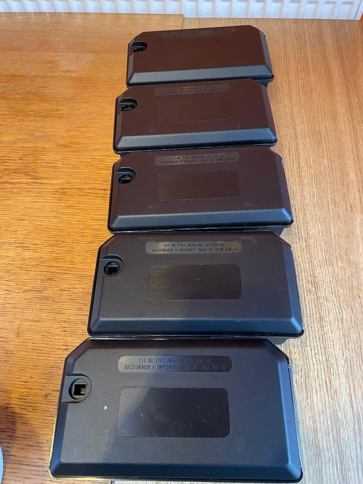 Tamper-resistant rodent bait stations used in commercial mice treatment